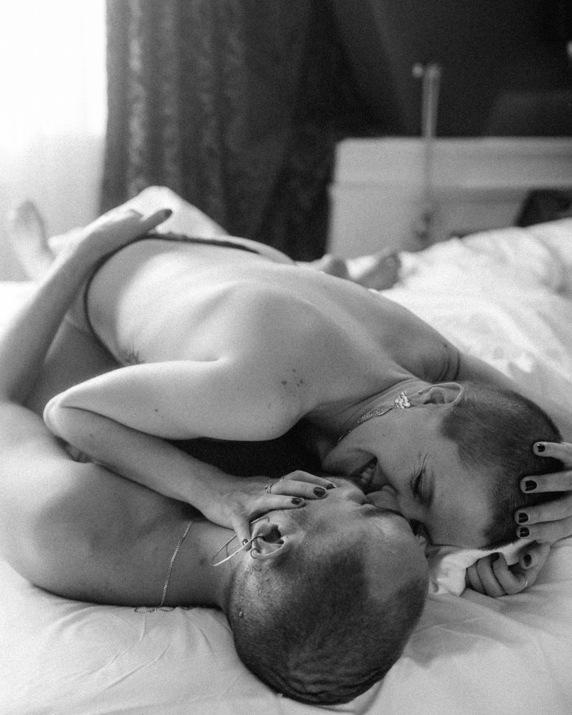 couple kuddling kissing