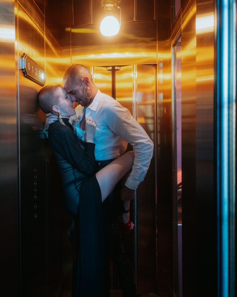 kissing couple elevator hotel kinky